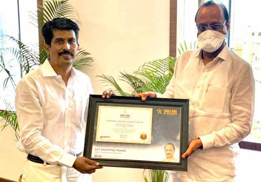 Ajit Pawar, Deputy CM of Maharashtra, gets felicitated by Deepak Harke, National secretary WBR India with certificate of Commitment (Switzerland)